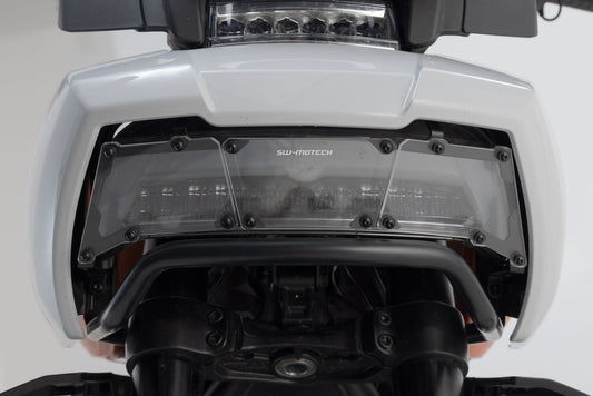 SW-MOTECH Protector de luces delanteras Soporte con panel de PVC. H-D Pan America (21-).