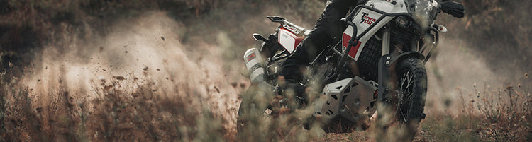 Accesorios de protección integral SW-MOTECH para motocicleta: defensas de motor, skid plates, sliders y cubrepuños con ingeniería alemana.