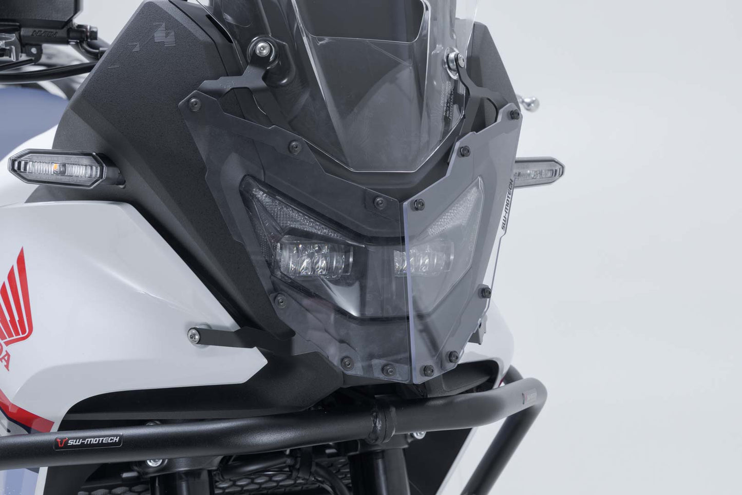 SW-MOTECH Protección de faros Soporte con embellecedor. XL750 Transalp (24-).