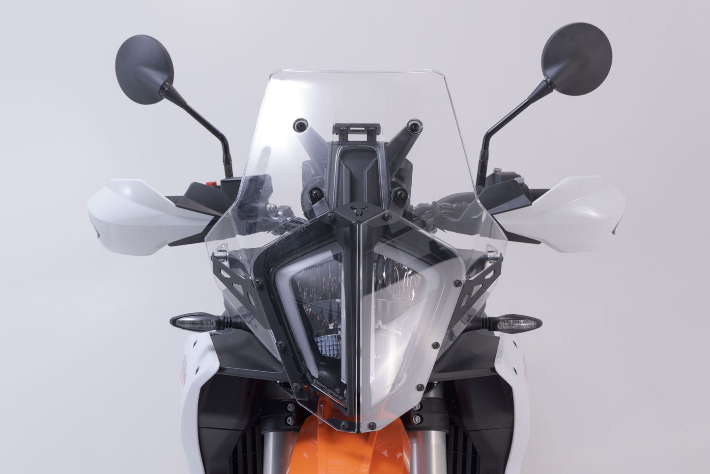 SW-MOTECH Protección de faros Soporte con embellecedor. KTM 890 Adv. R (22-).