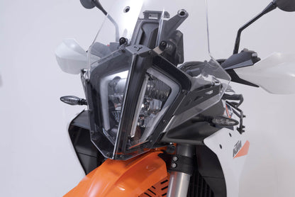 SW-MOTECH Protección de faros Soporte con embellecedor. KTM 890 Adv. R (22-).