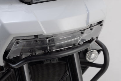 SW-MOTECH Protector de luces delanteras Soporte con panel de PVC. H-D Pan America (21-).