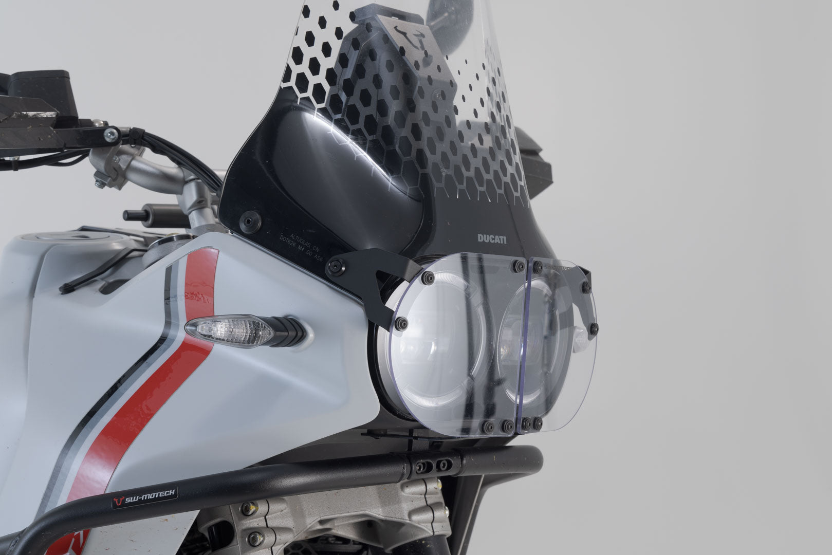 SW-MOTECH Protección de faros Soporte con embellecedor. Ducati DesertX (22-).