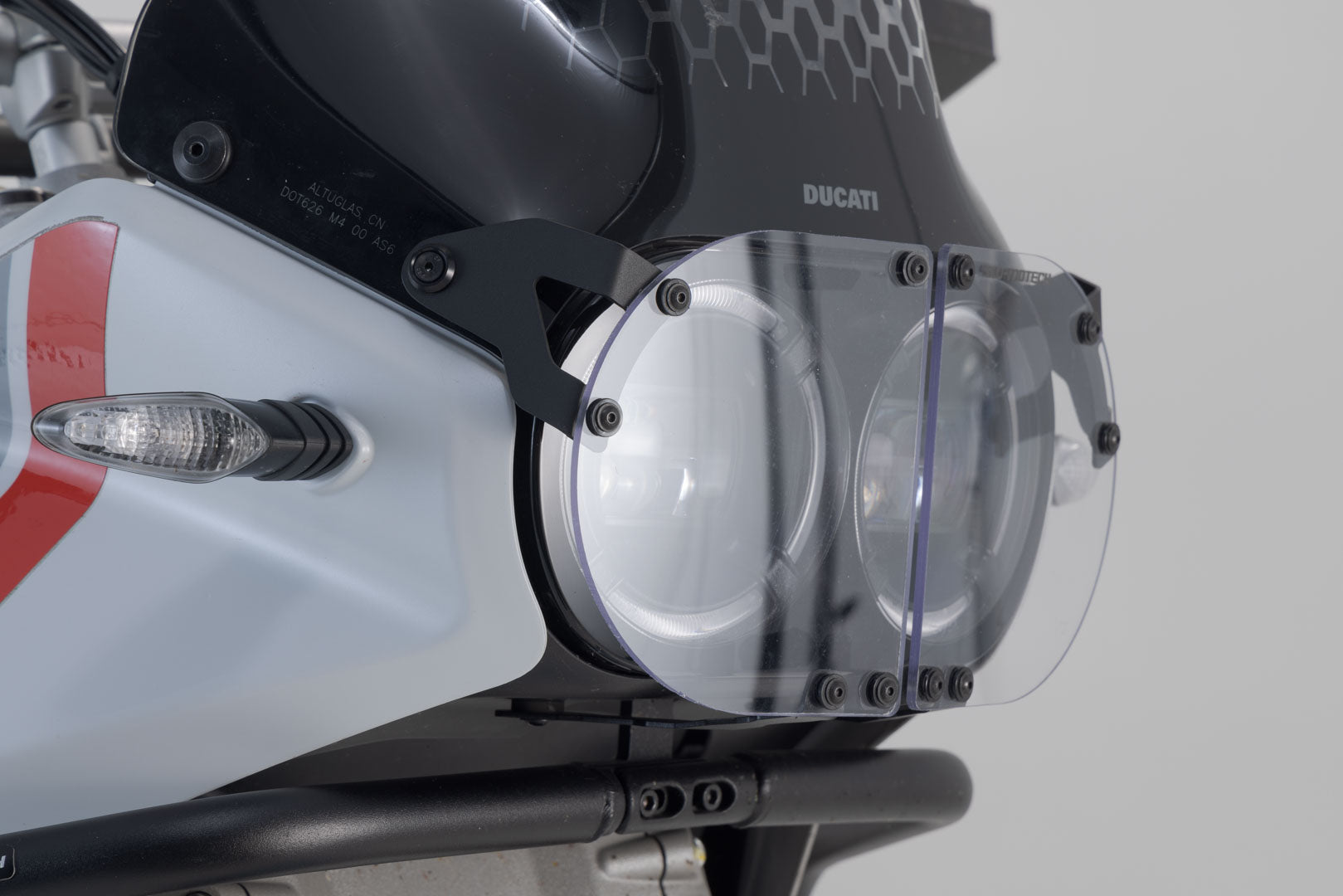 SW-MOTECH Protección de faros Soporte con embellecedor. Ducati DesertX (22-).