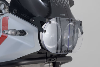 SW-MOTECH Protección de faros Soporte con embellecedor. Ducati DesertX (22-).