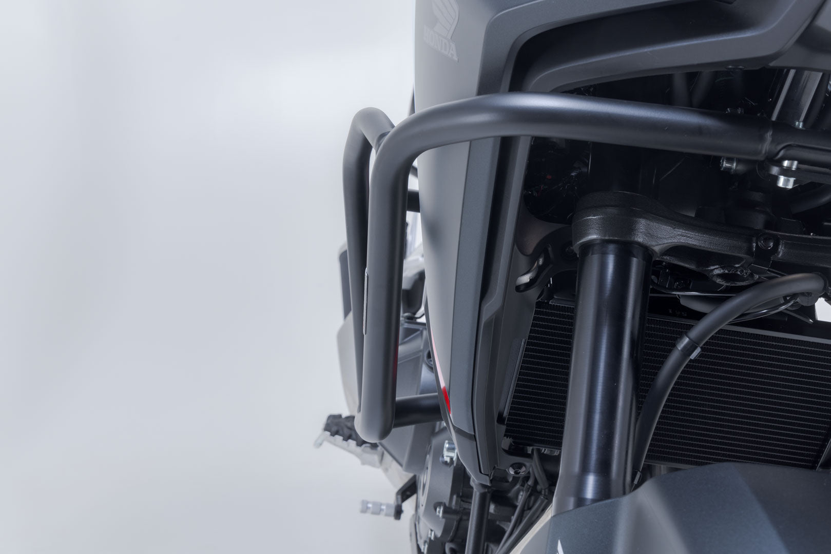 SW-MOTECH Protecciones laterales de motor Negro. Honda NX500 (23-).