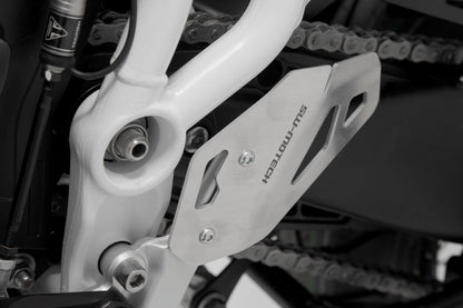 SW-MOTECH Protector de talón izquierdo Negro. Triumph Tiger 900/GT/Rally/Pro (19-23).