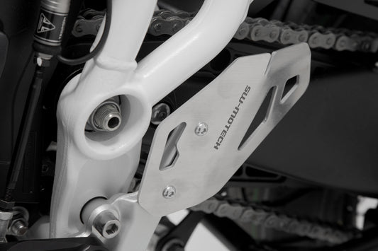 SW-MOTECH Protector de talón izquierdo Negro. Triumph Tiger 900/GT/Rally/Pro (19-23).