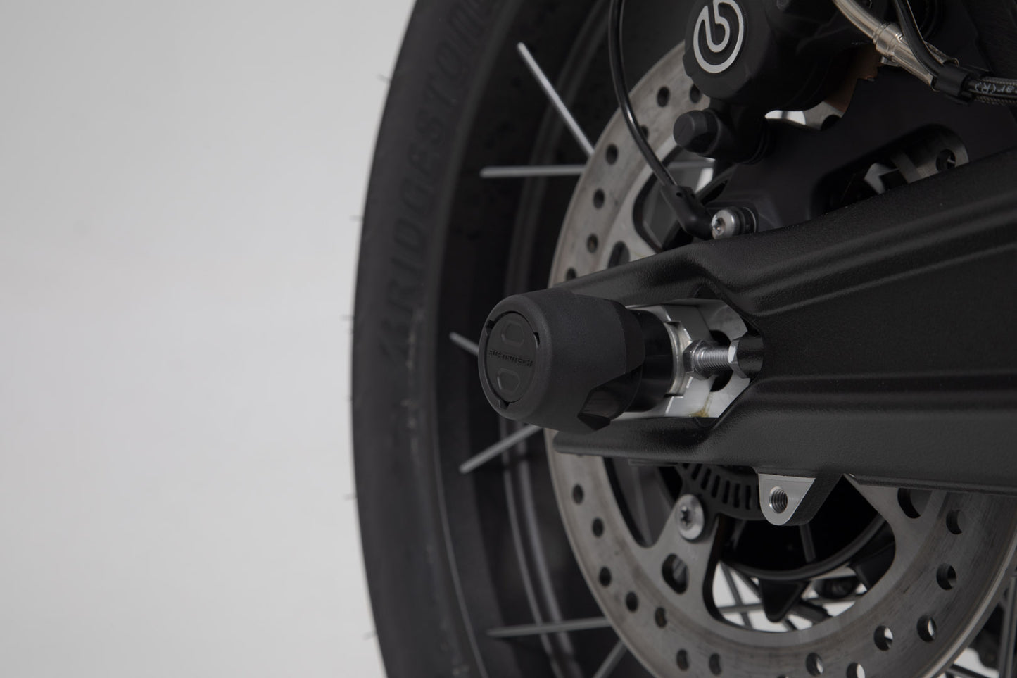 SW-MOTECH Kit de topes anticaidas para el eje trasero Negro. Triumph Tiger 800/ 900 Trident 660.