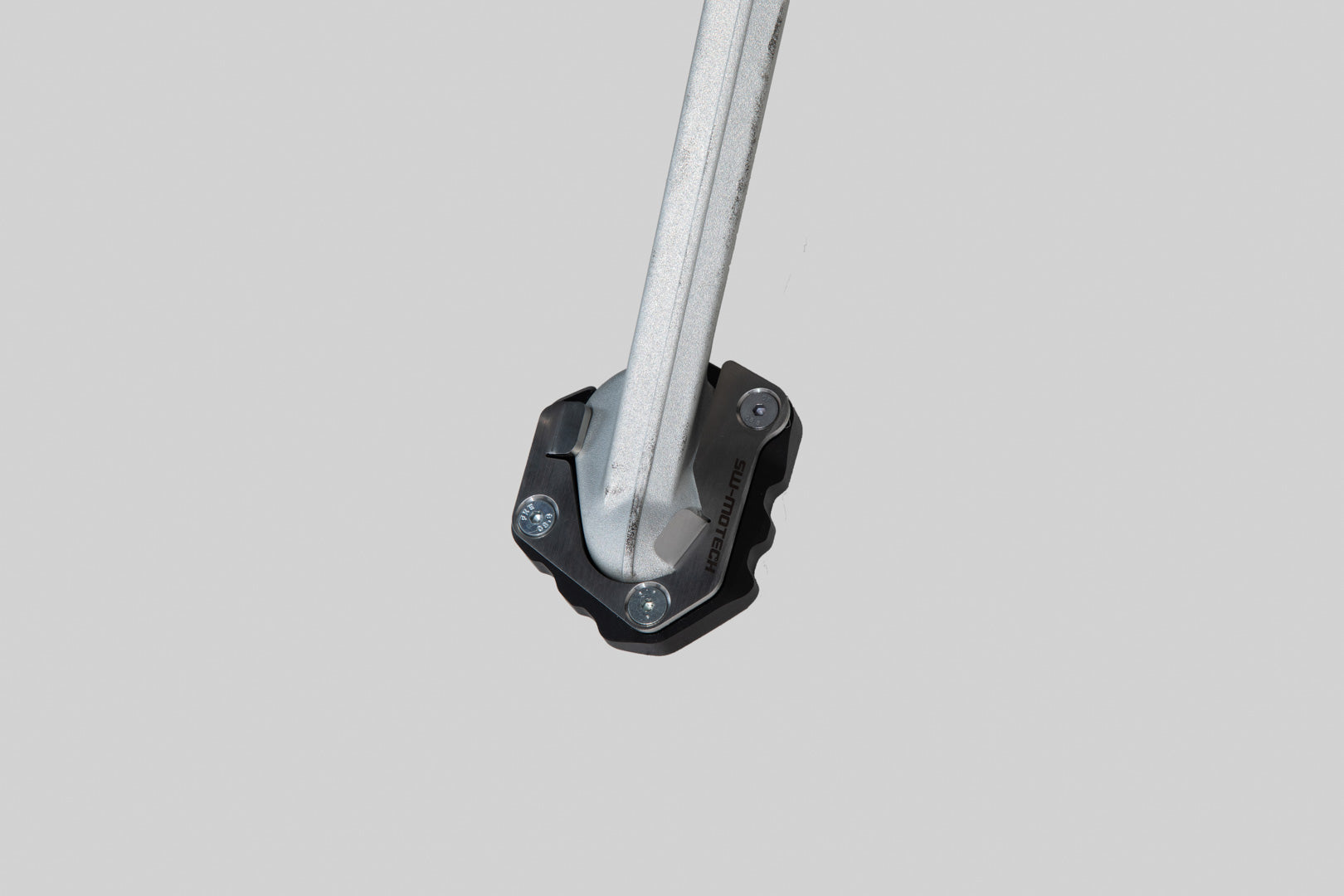 SW-MOTECH Extension para caballete lateral Negro/Plateado. Triumph Tiger 900/GT/Pro (19-).
