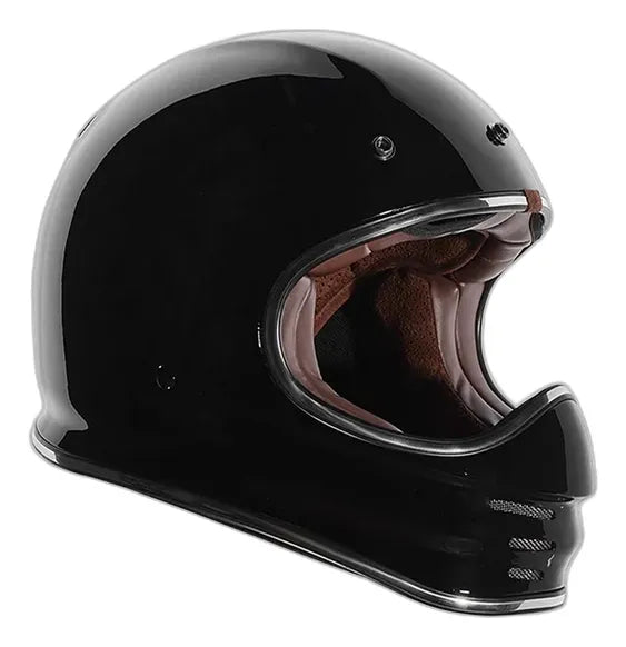 Vista lateral del casco retro MX TORC Baja T3 negro sin visera, con broches visibles